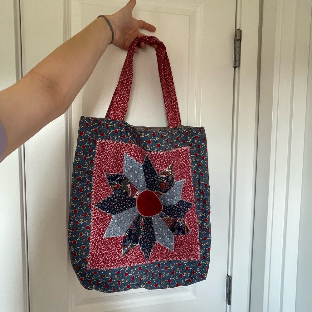 Handmade patchwork tote bag with a cherry red and blue design